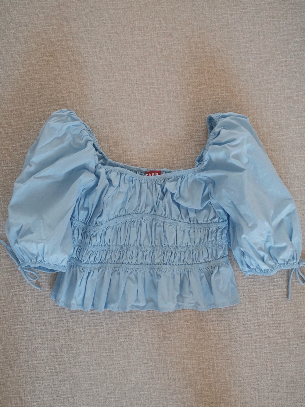 STAUD Faye Smocked Ruffle Top